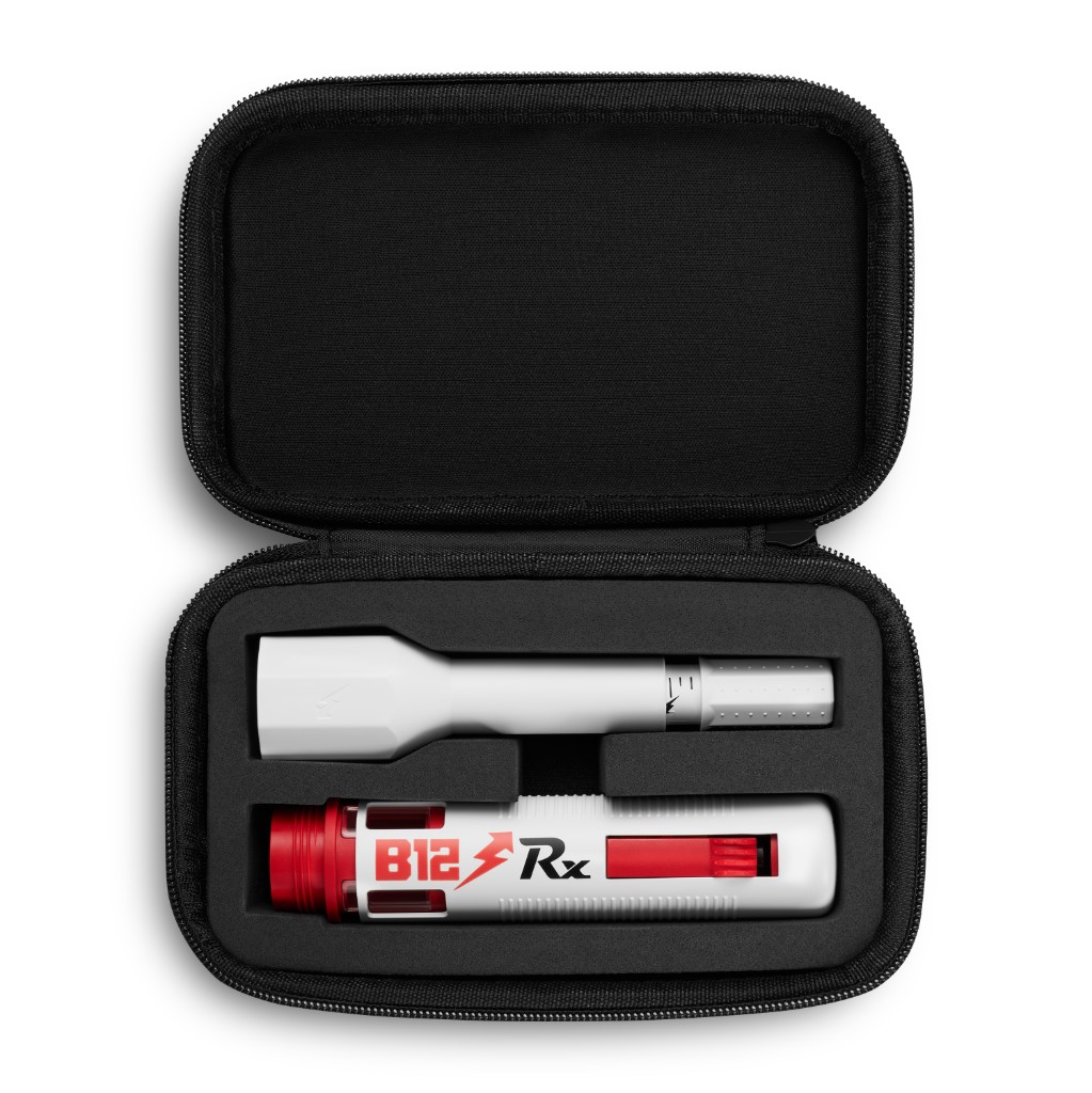 Open B12Rx case with the self-injector and a prefilled syringe seated in foam