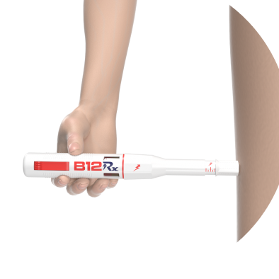 The B12Rx self-injector held against the skin.